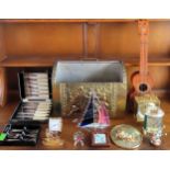 Sundry lot including brass magazine rack, cased set of fish knives and forks, clocks, small guitar