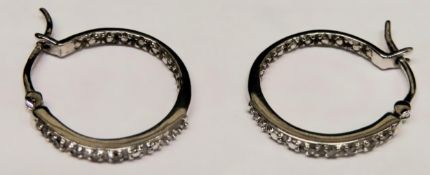 Pair of pretty 9ct white gold hoop earrings set with small clear stones. Total Weight Approx. 2.7g