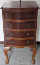 Small walnut veneered serpentine fronted chest of four drawers. Approx. 73cm H x 41cm W x 36cm D