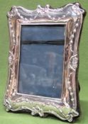 Hallmarked silver photograph frame. Approx. 21 x 16cms