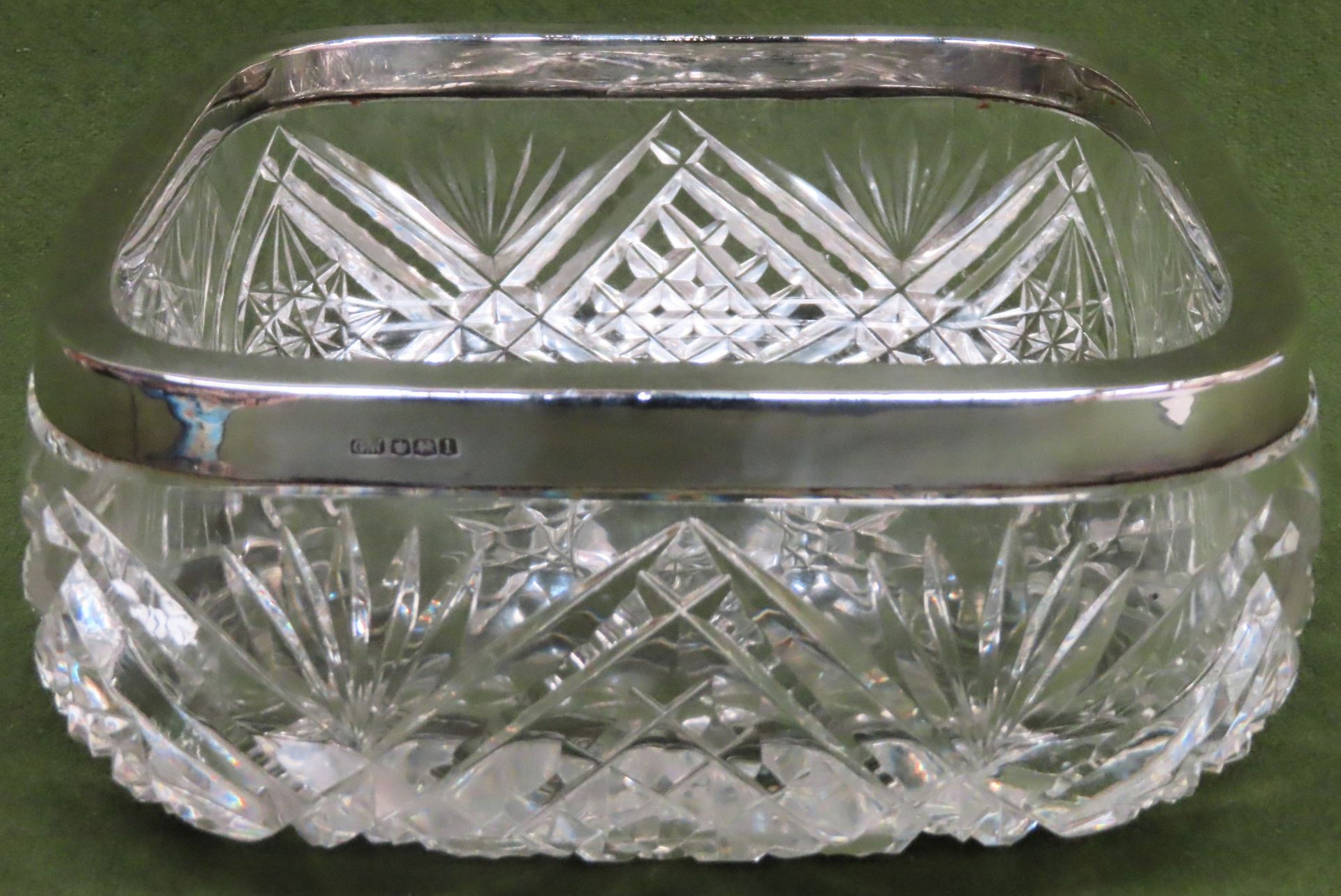 Hallmarked silver rimmed glass fruit bowl. Rim stamped with Chester assay, by George Wish & Co