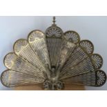 Vintage brass extending Peacock firescreen. Approx. 64 x 96cm