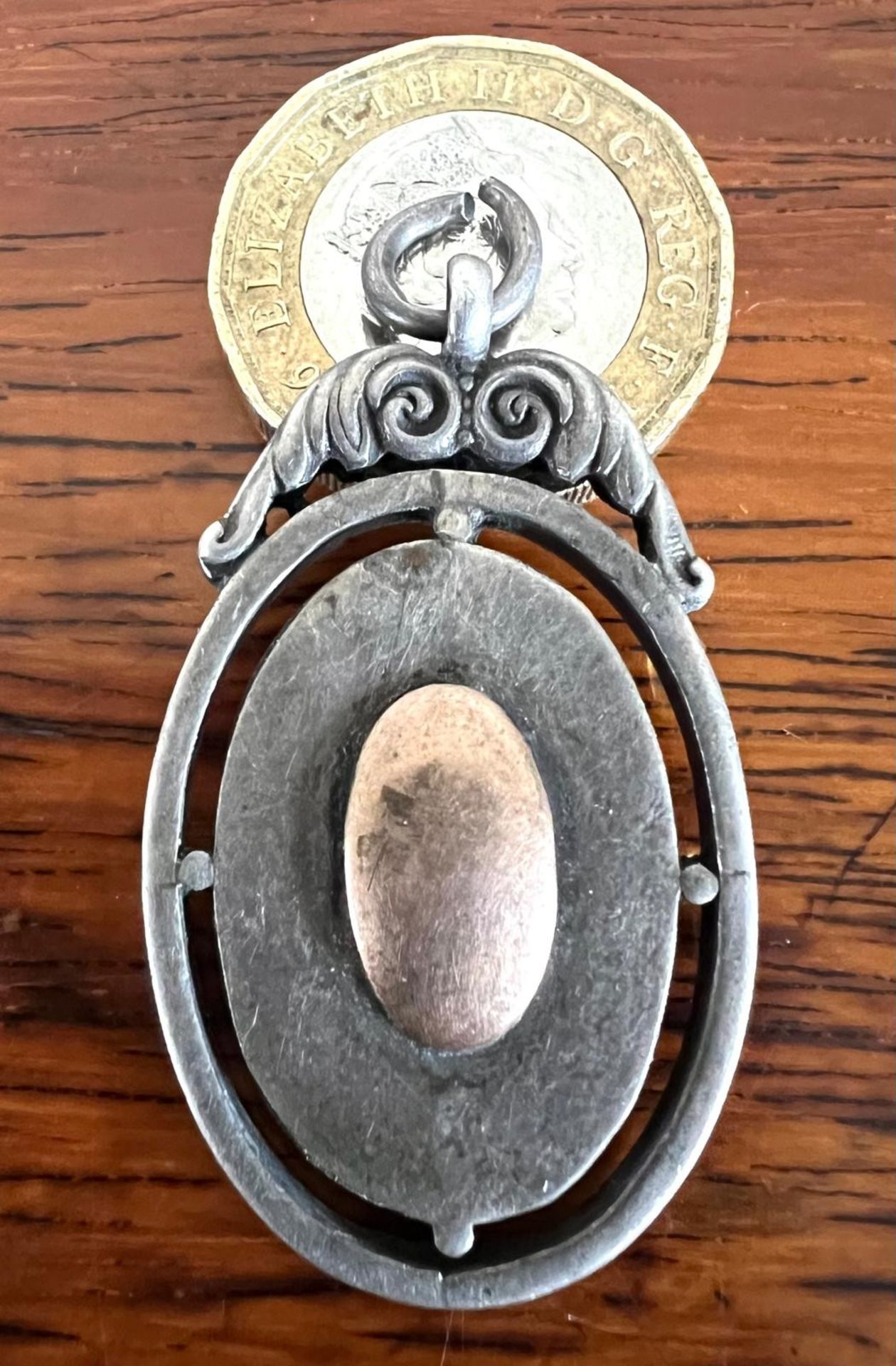 SILVER AND GOLD FOB, INSCRIBED L THORNTON, WEIGHT APPROX 11.7g