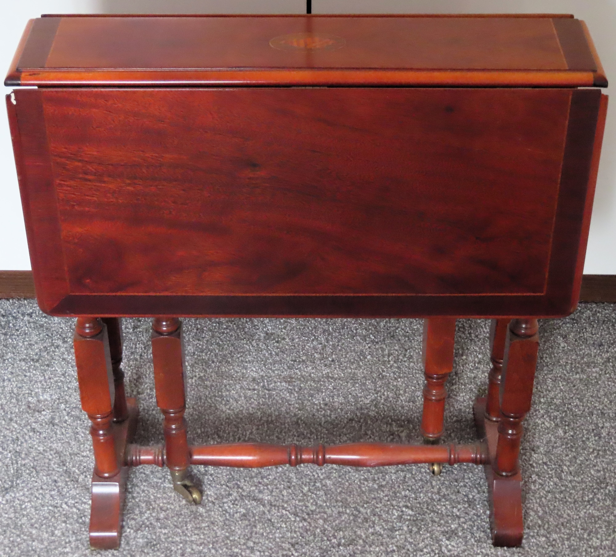 20th century shell + string inlaid small sutherland table. Approx. 57cm H x 64cm W x 55cm D