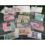 Quantity of various mostly foreign banknotes, loose postage stamps etc