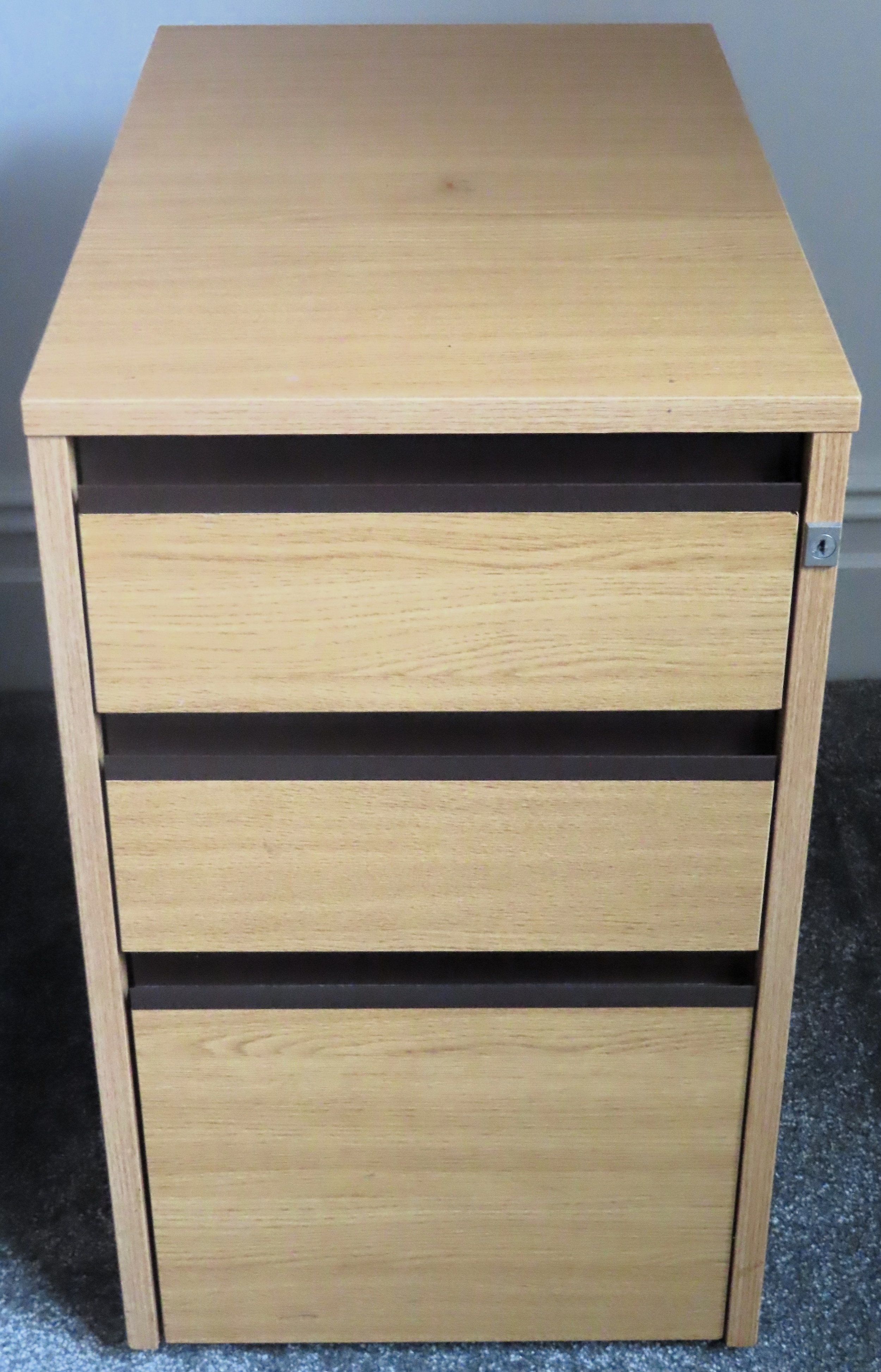 20th century light oak three drawer filing cabinet. Approx. 65cm H x 39cm W x 63cm D