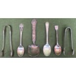 Quantity of silver flatware Inc. sugar tongs, souvenir spoon, other spoons etc