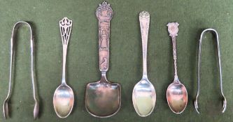 Quantity of silver flatware Inc. sugar tongs, souvenir spoon, other spoons etc