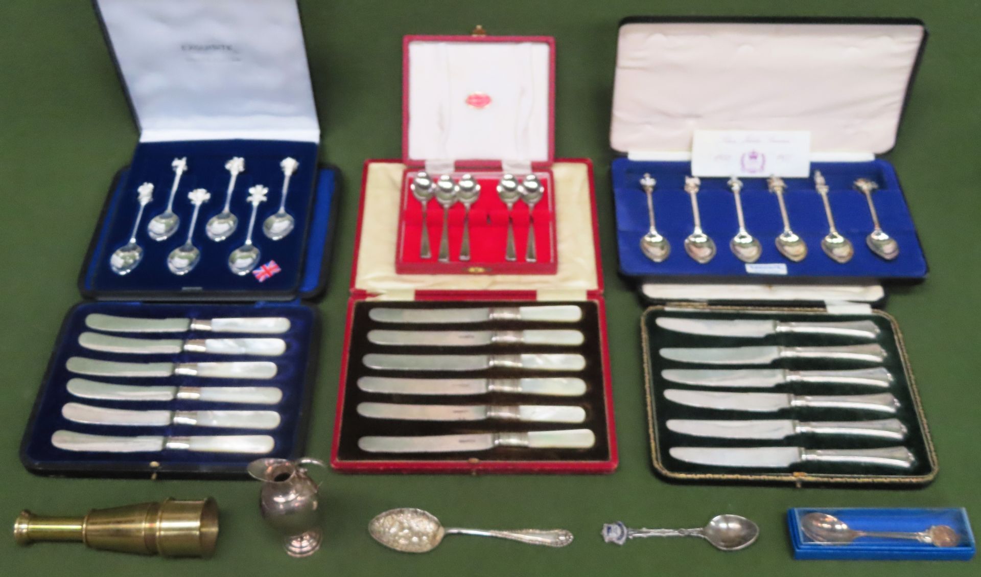 Various cased silver banded and handled knives, other silver plated flatware, small brass telescope