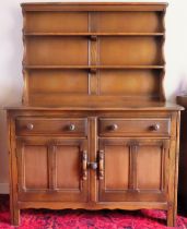 Ercol mid 20th century oak panelled kitchen dresser with plate rack