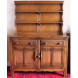 Ercol mid 20th century oak panelled kitchen dresser with plate rack