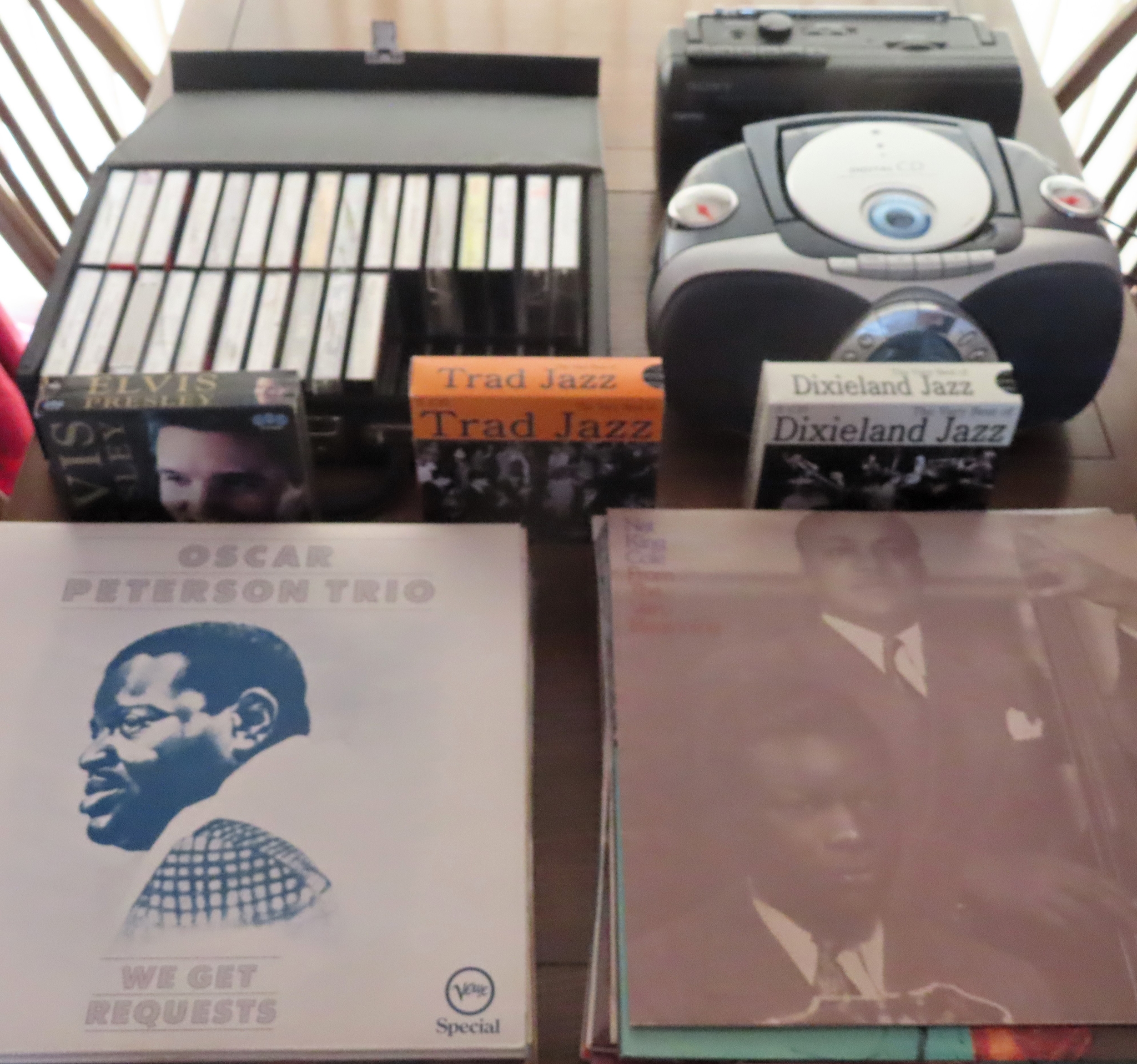 Sundry lot including two portable cd players, cds, cassettes, jazz related vinyls etc