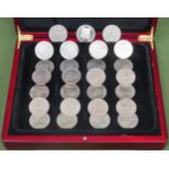 Case containing various commemorative crowns, Churchill, Charles & Diana, etc