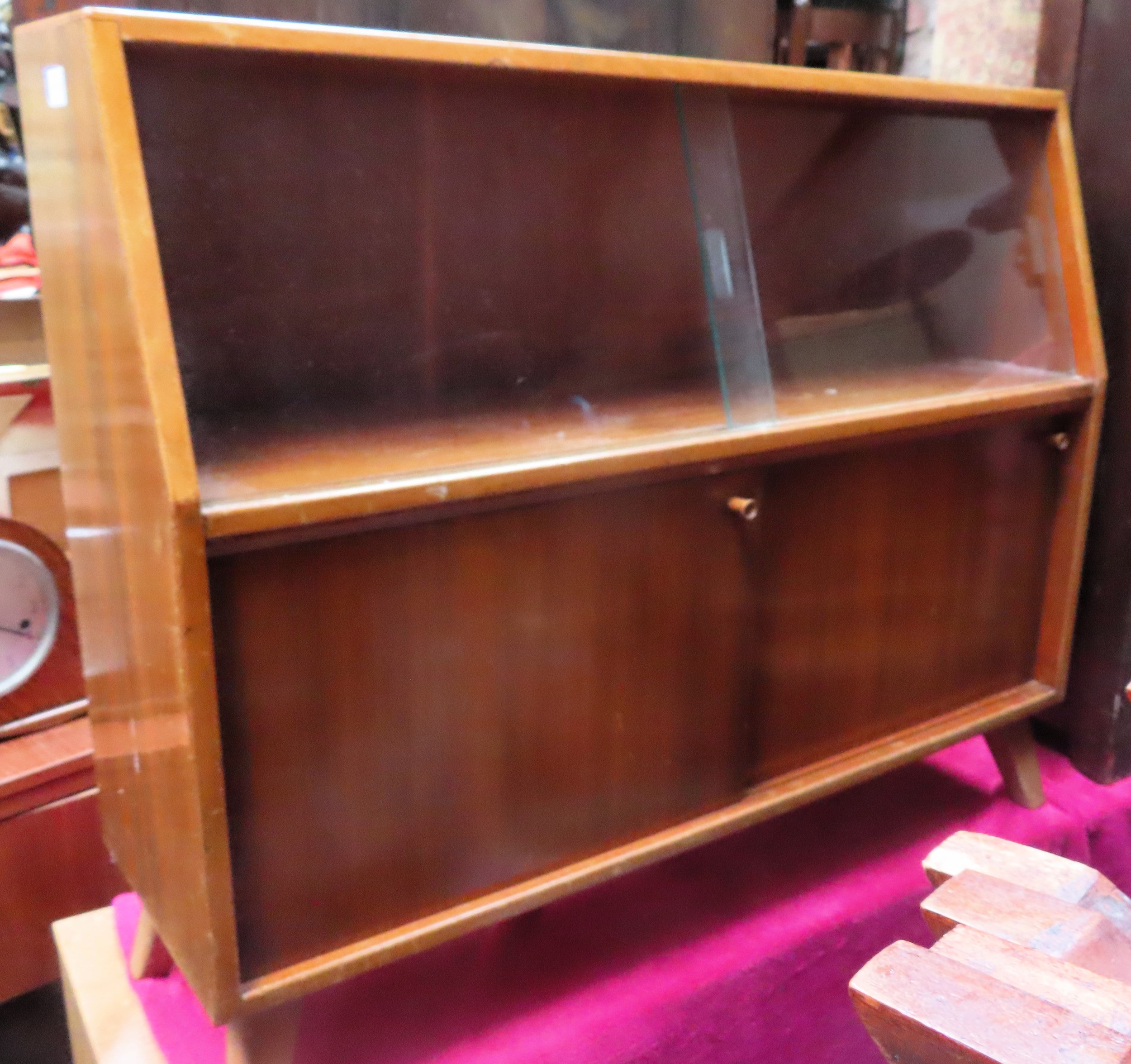 1970's small teak side cabinet with sliding doors. Approx. 76cm H x 92cm W x 28cm D