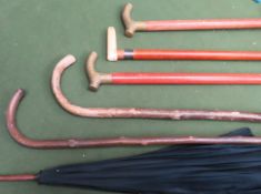 Parcel of various walking sticks, umbrella etc All in used condition, unchecked