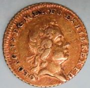 George I gold one quarter Guinea, dated 1718. Approx. 2.3g used condition
