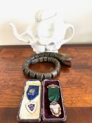 CERAMIC MARGARET THATCHER TEA POT, WOODEN ARTICULATED SNAKE AND TWO BUFFALO MEDALS