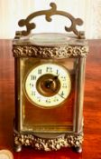 BRASS CARRIAGE CLOCK TIME PIECE, SCROLL DECORATION, APPROX 12cm HIGH