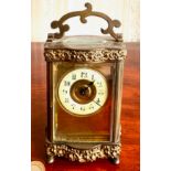 BRASS CARRIAGE CLOCK TIME PIECE, SCROLL DECORATION, APPROX 12cm HIGH