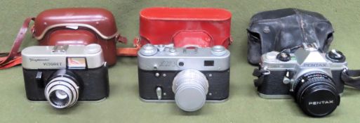 Vintage cased cameras Inc. F.E.D. 3 (USSR), Pentax MG, Voigtlander Vitoret, etc used not tested