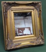 Small gilt framed wall mirror. Approx. 48cms x 42cms minor damage to frame