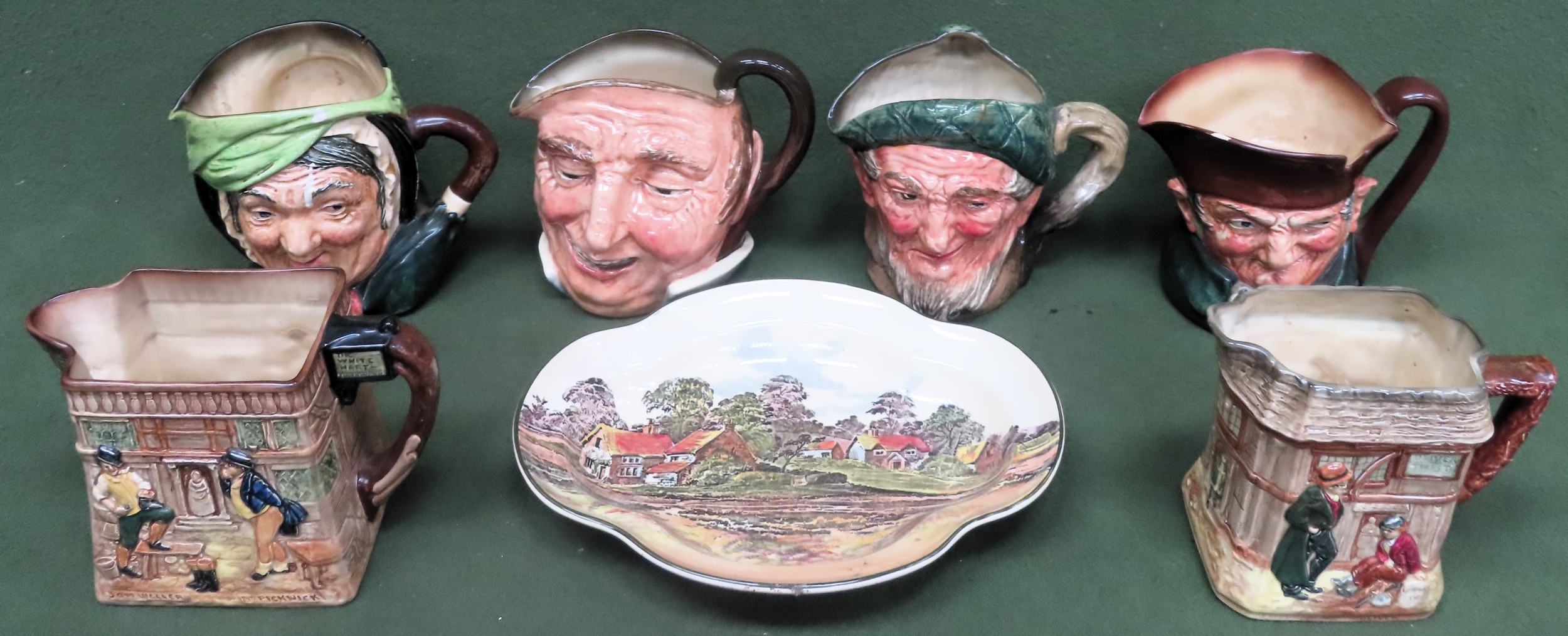 Quantity of Royal Doulton ceramics Inc. 4 character jugs, Two Dickens Ware jugs, plus shallow bowl/