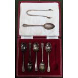 Casd set of 5 hallmarked silver coffee spoons, another silver teaspoon, plus silver sugar tongs.