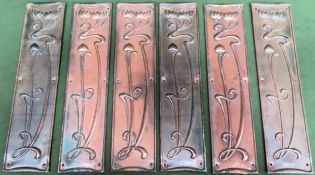 Set of six Art Nouveau copper repousse decorated finger plates. Approx. 30cms x 8cms reasonable used