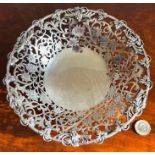 SILVER PIERCED VINE DECORATION GRAPE BOWL UPON THREE SCROLL SUPPORTS, STAMPED 9.25, SHEFFIELD D,