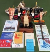 Sundry lot Inc. model boat, advertising plaques, old car manuals, Motorcycle magazines, etc all used