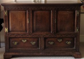 19th century carved fronted oak panelled two drawer sideboard with two cupboard doors. Approx. 92.