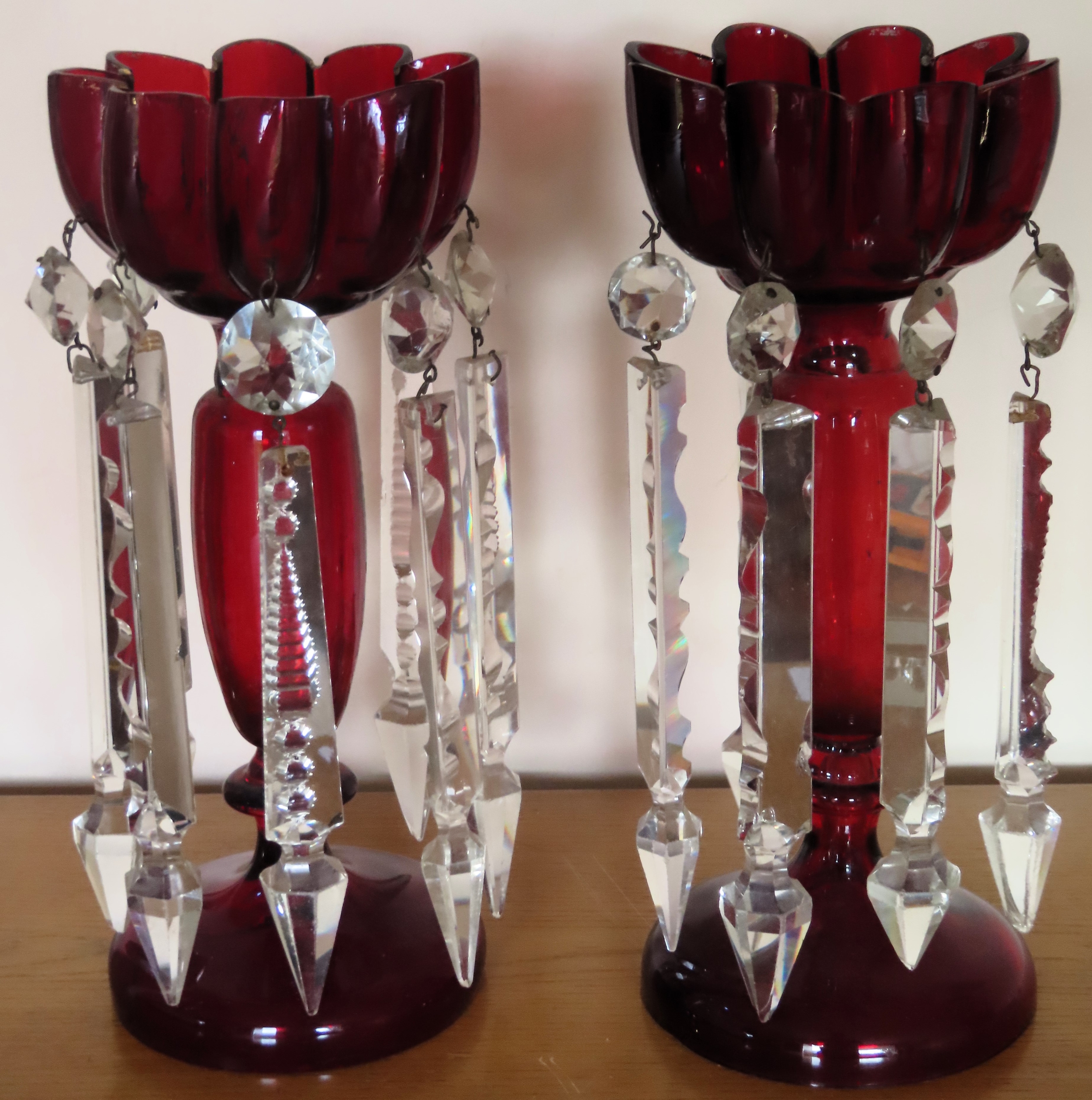 Pair of Victorian ruby glass lustres with droplets. Approx. 28cm H Used condition, two droplets