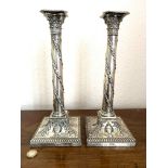 PAIR OF SILVER CANDLESTICKS, DISSIMILAR, LONDON ASSAY, WEIGHTED BASES, APPROX 32cm HIGH