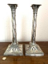 PAIR OF SILVER CANDLESTICKS, DISSIMILAR, LONDON ASSAY, WEIGHTED BASES, APPROX 32cm HIGH