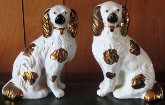 Pair of small Antique Staffordshire hand painted ceramic Spaniels. Approx. 18cms H reasonable used