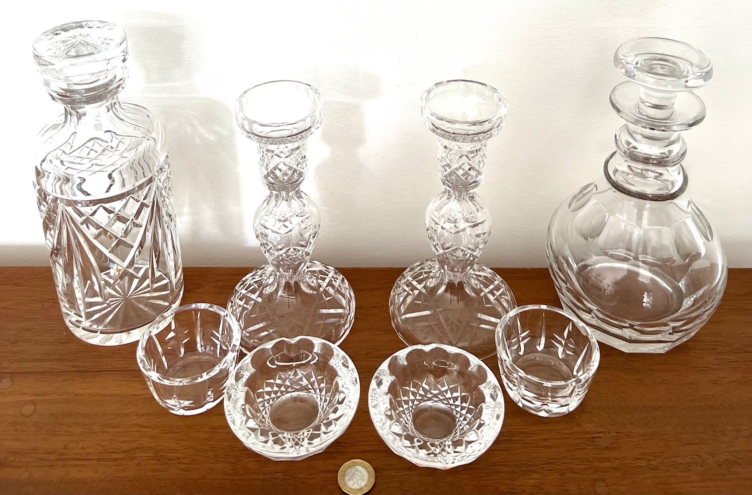 PAIR OF WATERFORD CANDLESTICKS, TWO ASHTRAYS, SMALL BOWLS, TWO DECANTERS (NOT WATERFORD)