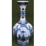 Blue and White glazed ceramic Delft vase, with panels depicting Dutch scenes. Approx. 30cm H Used