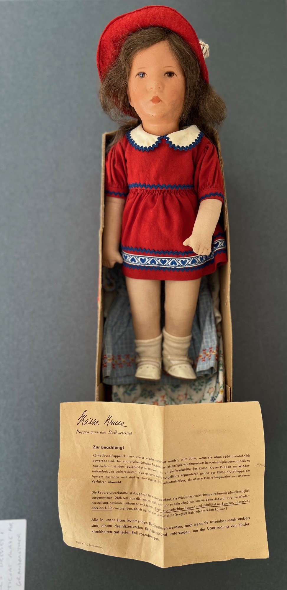 GERMAN DOLL, COMPOSITION HEAD, FABRIC BODY PLUS ASSOCIATED PERIOD CLOTHING