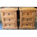 Pair of 20th century pine three drawer bedside cabinets. Approx. 67cm H x 53cm W x 39cm D Both in