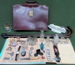 Sundries Inc. leather case, old newspapers, walking sticks, etc all used and unchecked