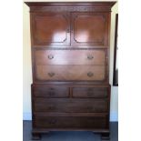 Mahogany chest on chest with two cupboard doors. Approx. 182cm H x 43cm W x 51cm D Used condition,