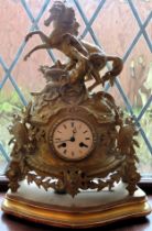 French style gilt metal and ornately decorated mantle clock, on gilded stand used not tested dial