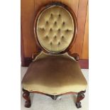 Victorian carved walnut upholstered low seated nursing chair. Approx. 91cms H reasonable used