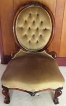 Victorian carved walnut upholstered low seated nursing chair. Approx. 91cms H reasonable used