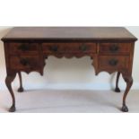 20th century walnut veneered five drawer desk. Approx. 76cm H x 123cm W x 65cm D Used condition,