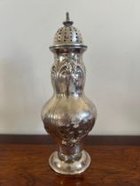 SILVER COLOURED SHAKER, STAMPED STERLING TO BASE