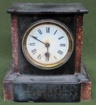 Vintage black slate mantle clock with enamelled circular dial. Approx. 21cm Used condition, not