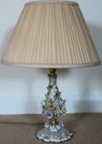 Contintal style relief floral decorated ceramic table lamp with shade. Approx. 51cms H used with