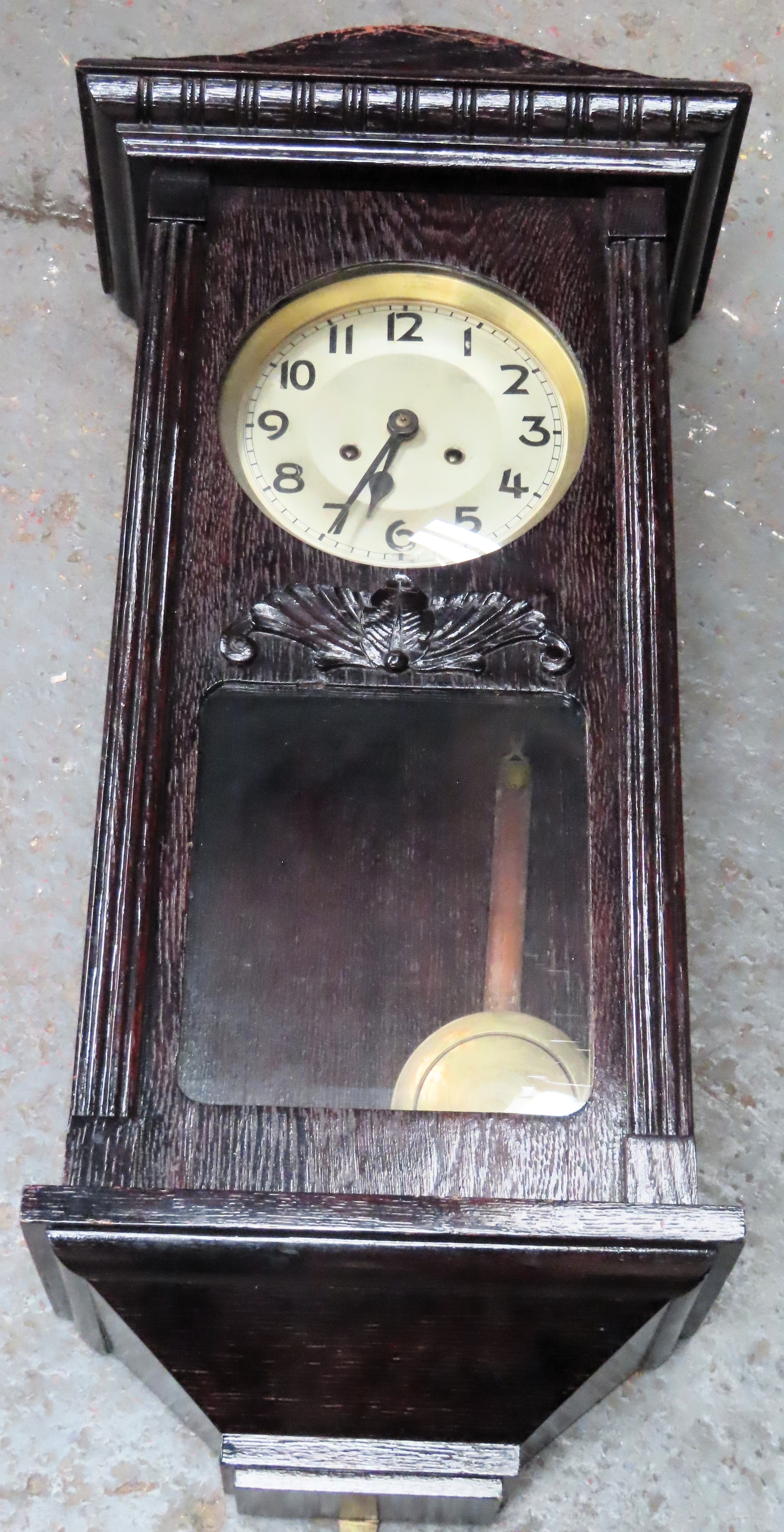 Early 20th century dark wood wall hanging clock. Approx. 80cm