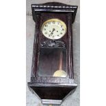 Early 20th century dark wood wall hanging clock. Approx. 80cm